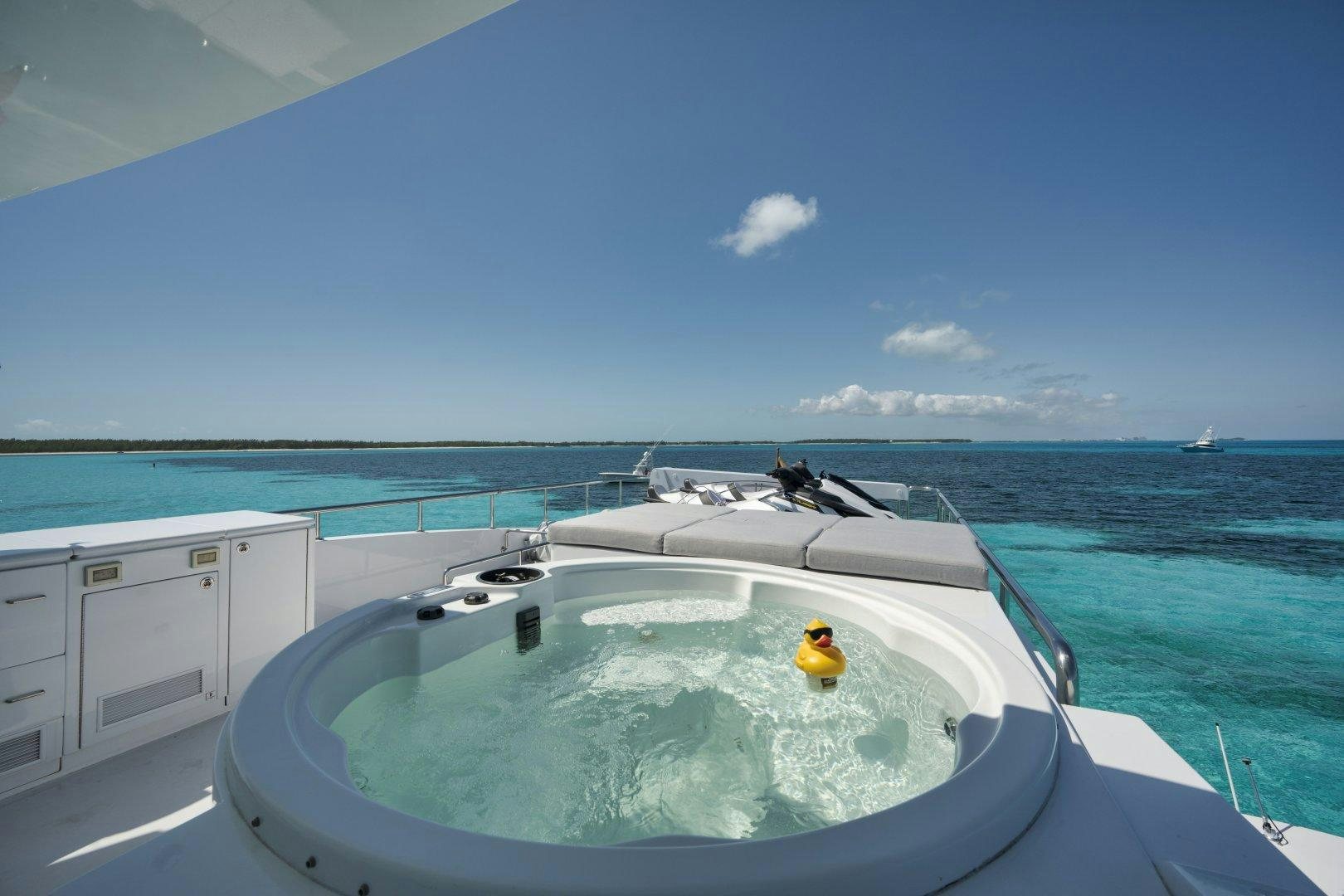 a boat in the water aboard LIMITLESS Yacht for Sale