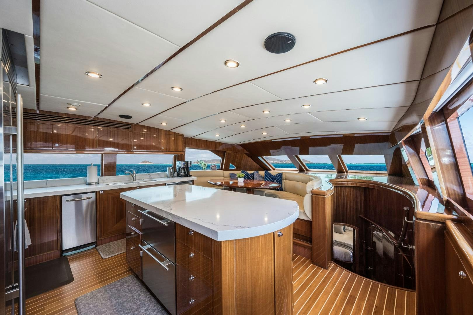 a kitchen and living room aboard LIMITLESS Yacht for Sale