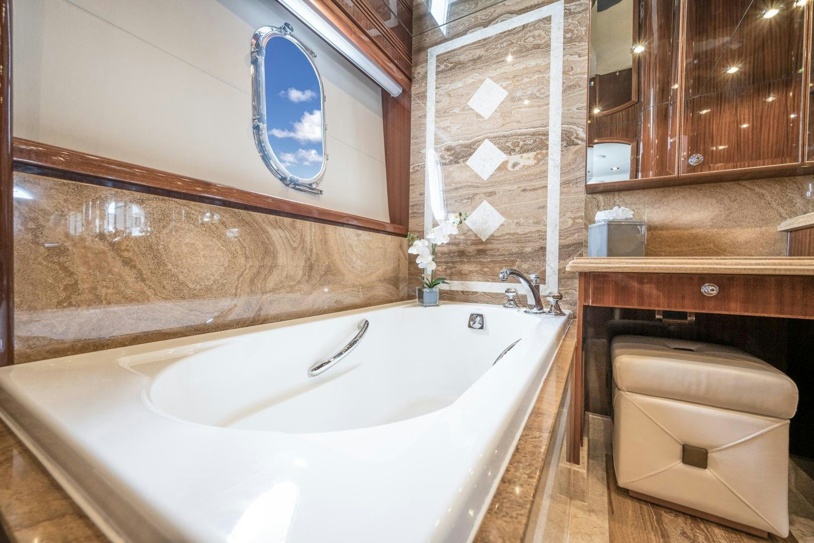 a bathroom with a sink and a toilet aboard LIMITLESS Yacht for Sale