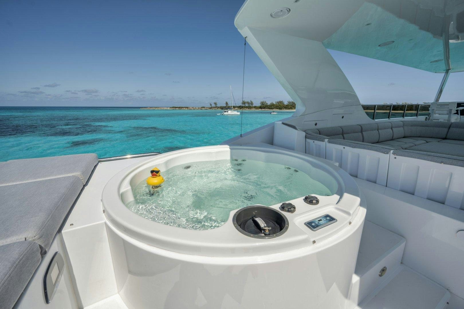 a swimming pool with a rubber duck in it aboard LIMITLESS Yacht for Sale