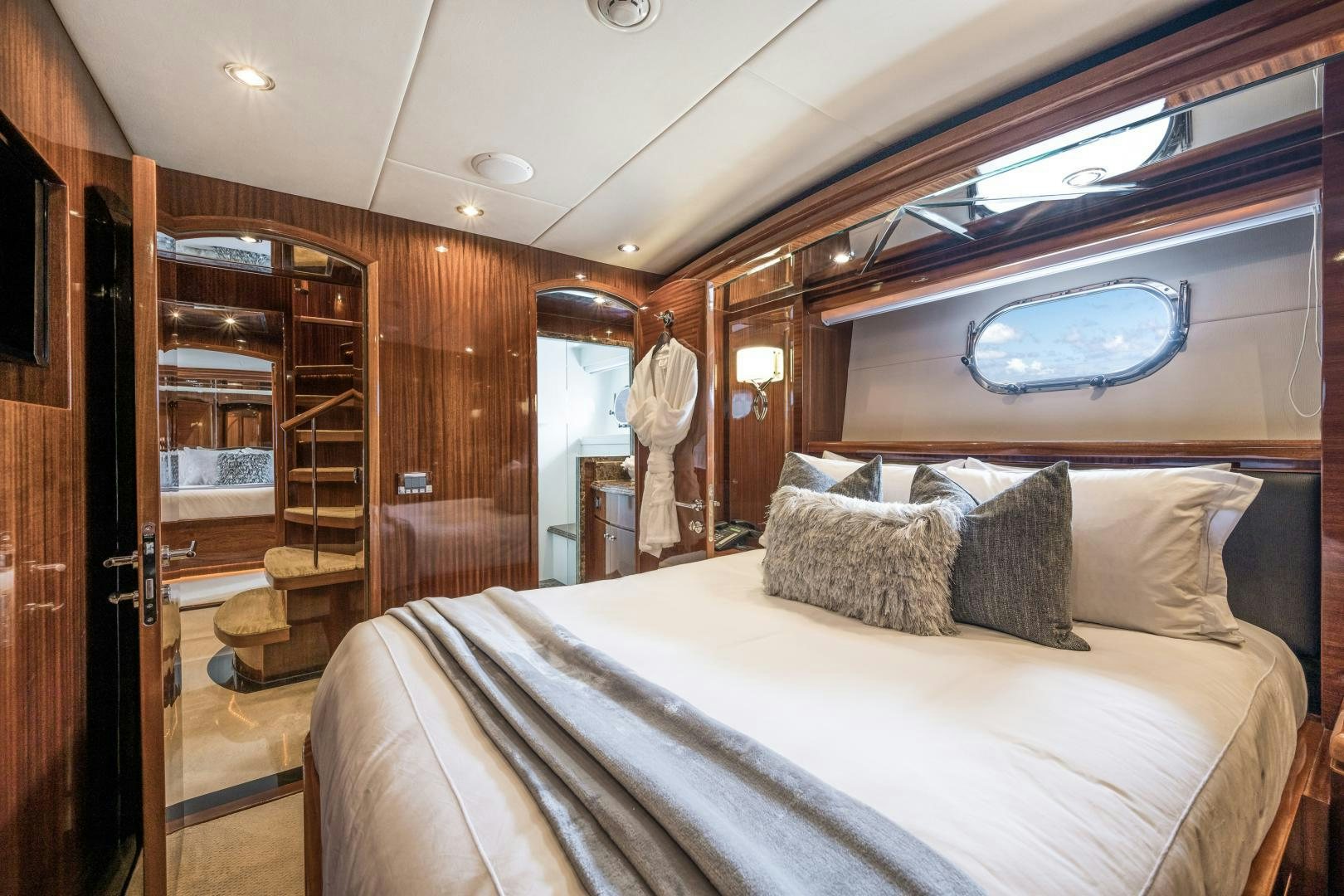 a bed in a cabin aboard LIMITLESS Yacht for Sale