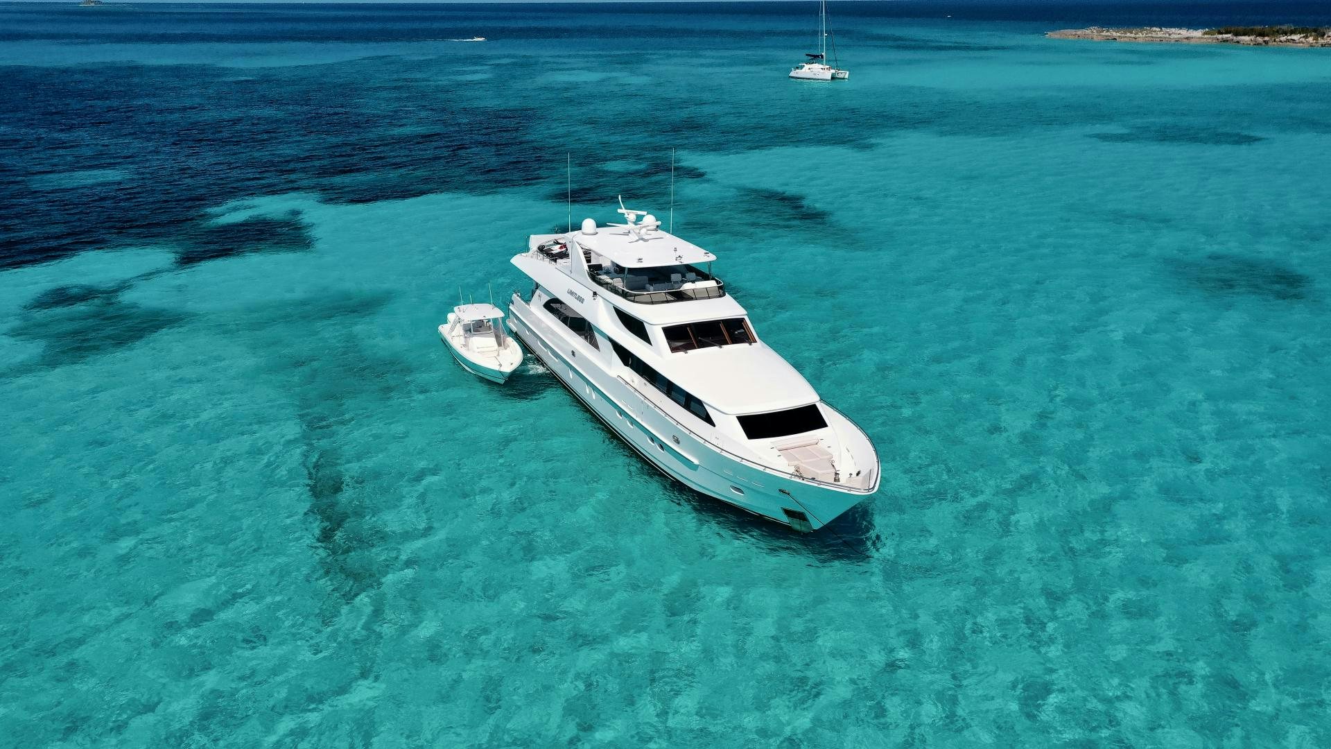 a boat in the water aboard LIMITLESS Yacht for Sale