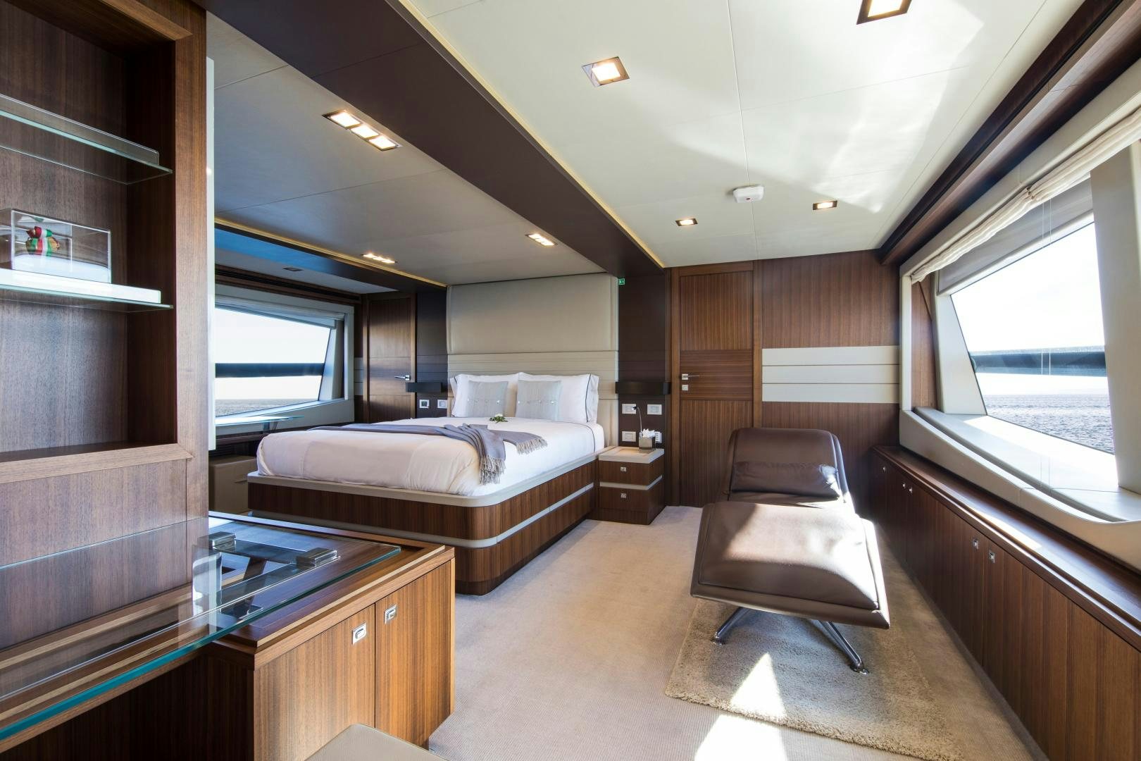 a room with a bed and a desk aboard CAMPO VERDE Yacht for Sale