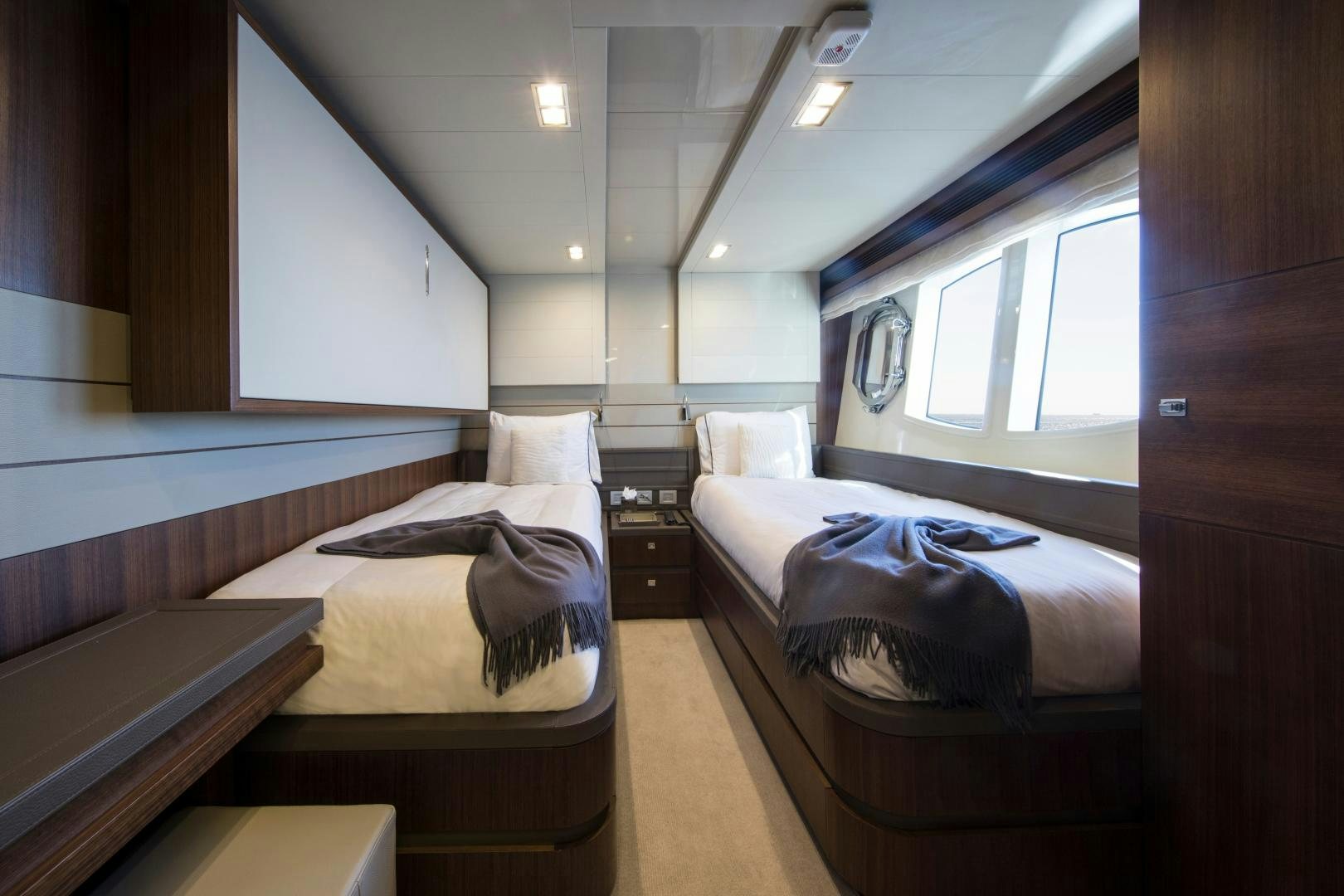a room with two beds aboard CAMPO VERDE Yacht for Sale