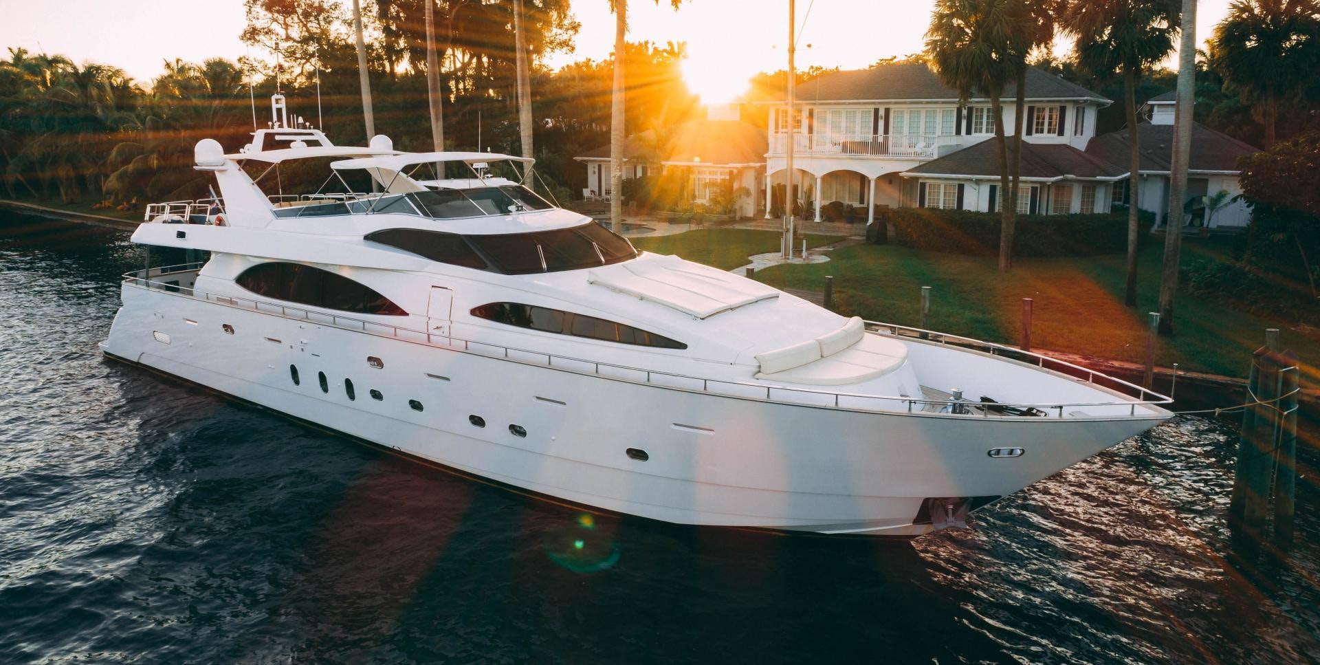 a white yacht on the water aboard CRISTALES Yacht for Sale