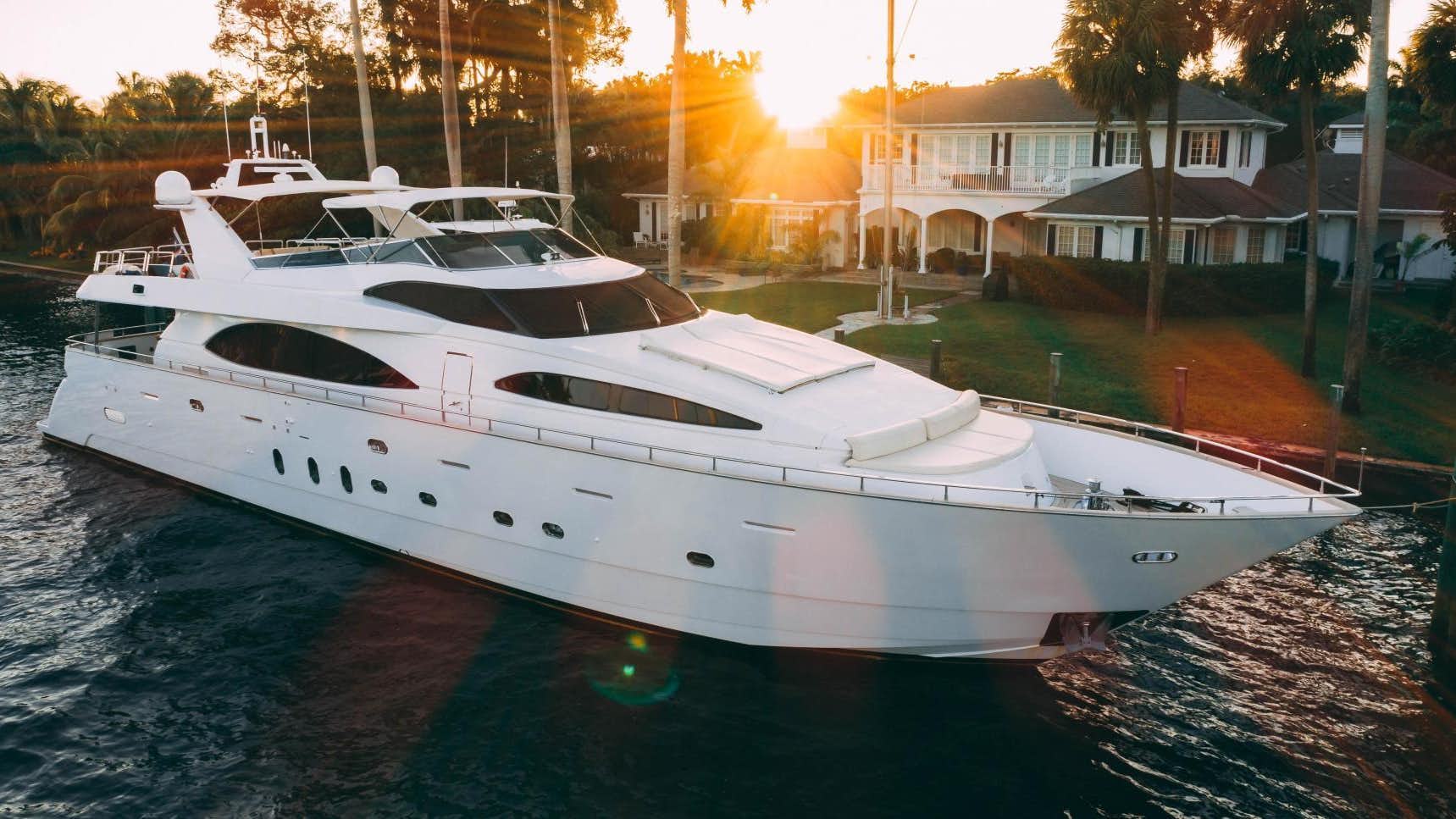 a white yacht on the water aboard CRISTALES Yacht for Sale