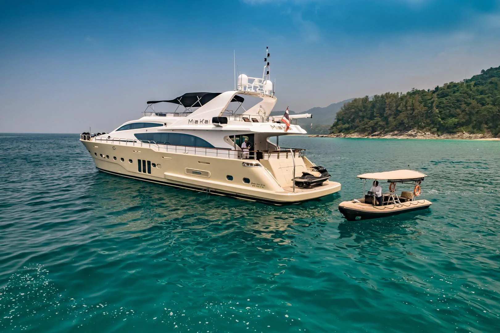 a boat sailing on the water aboard MIA KAI Yacht for Sale