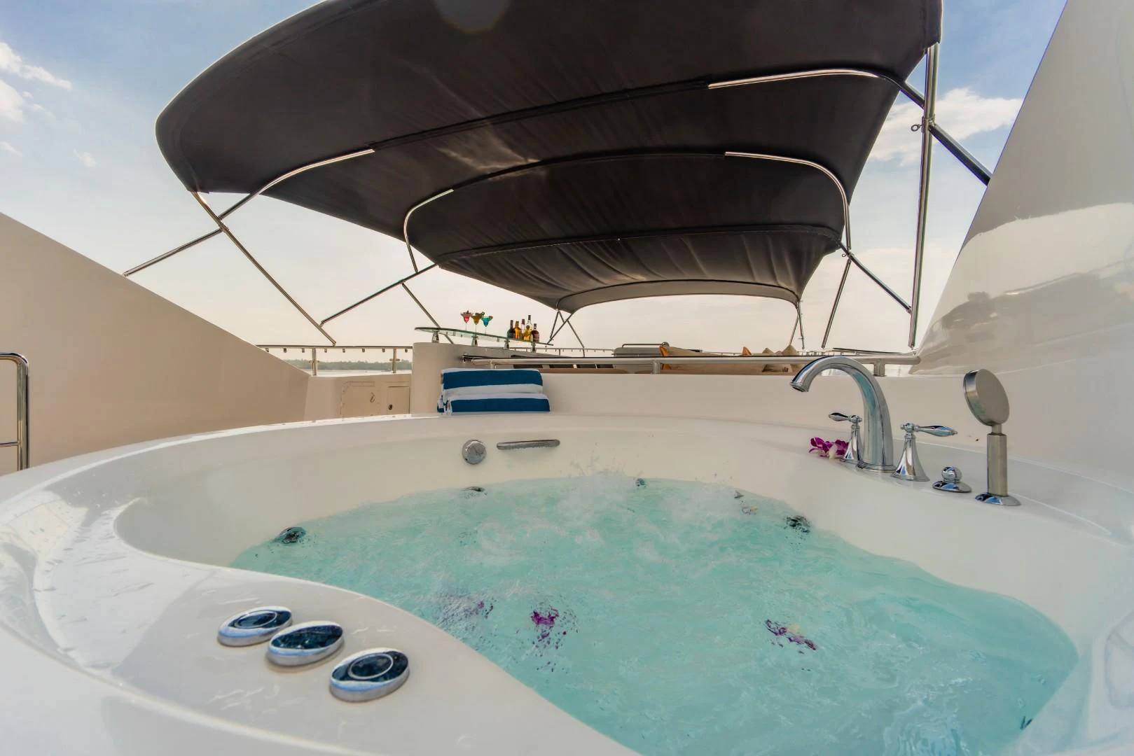 a large white and black boat with a white roof aboard MIA KAI Yacht for Sale