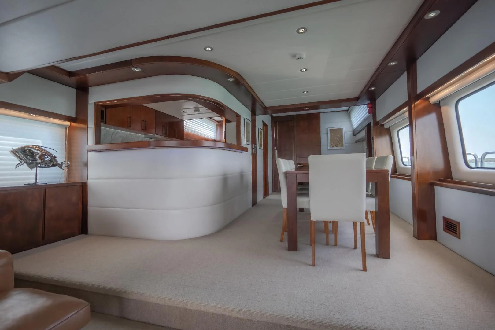 a room with a bed and a desk aboard MIA KAI Yacht for Sale