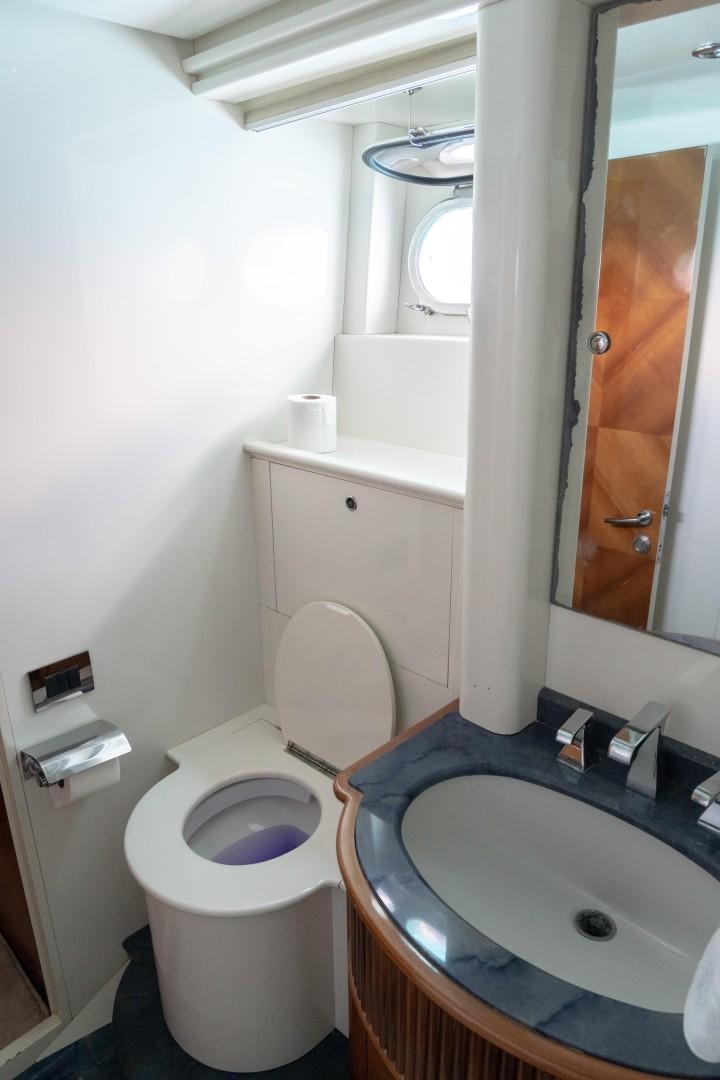 a bathroom with a sink and a toilet aboard EL CAPRICHO Yacht for Sale
