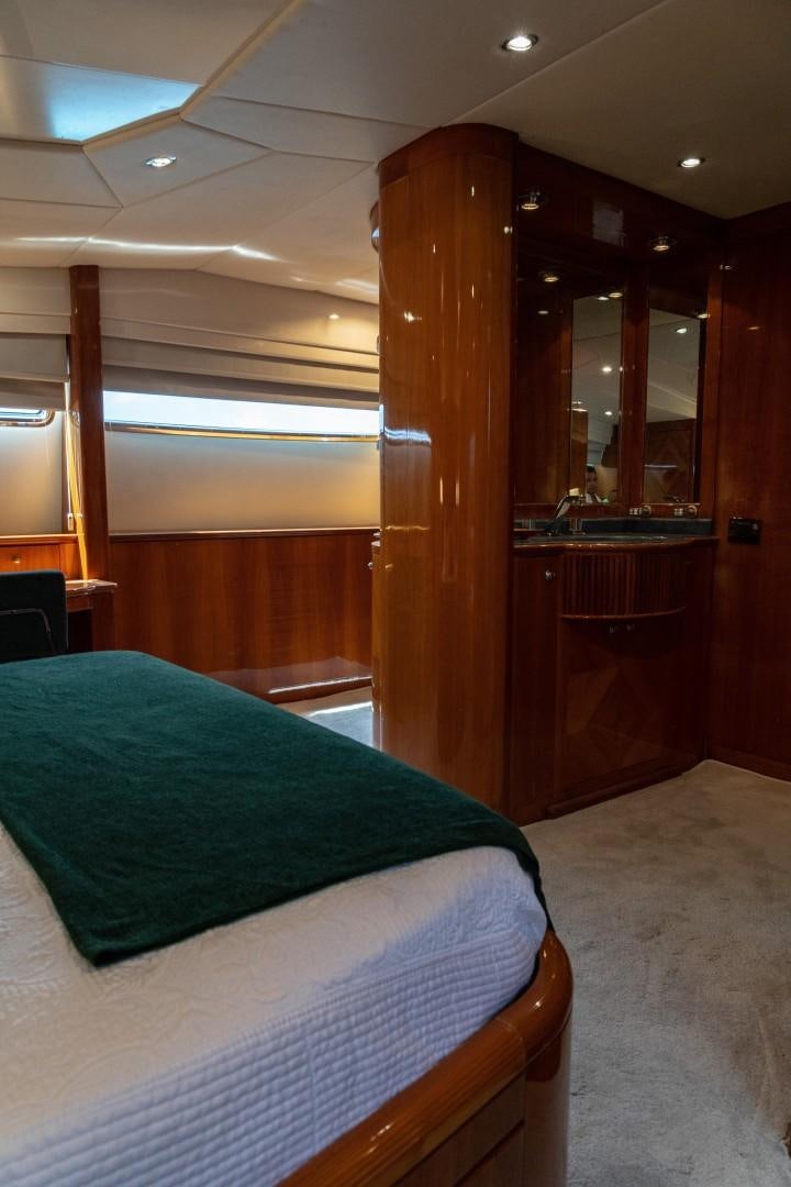 a bed in a room aboard EL CAPRICHO Yacht for Sale