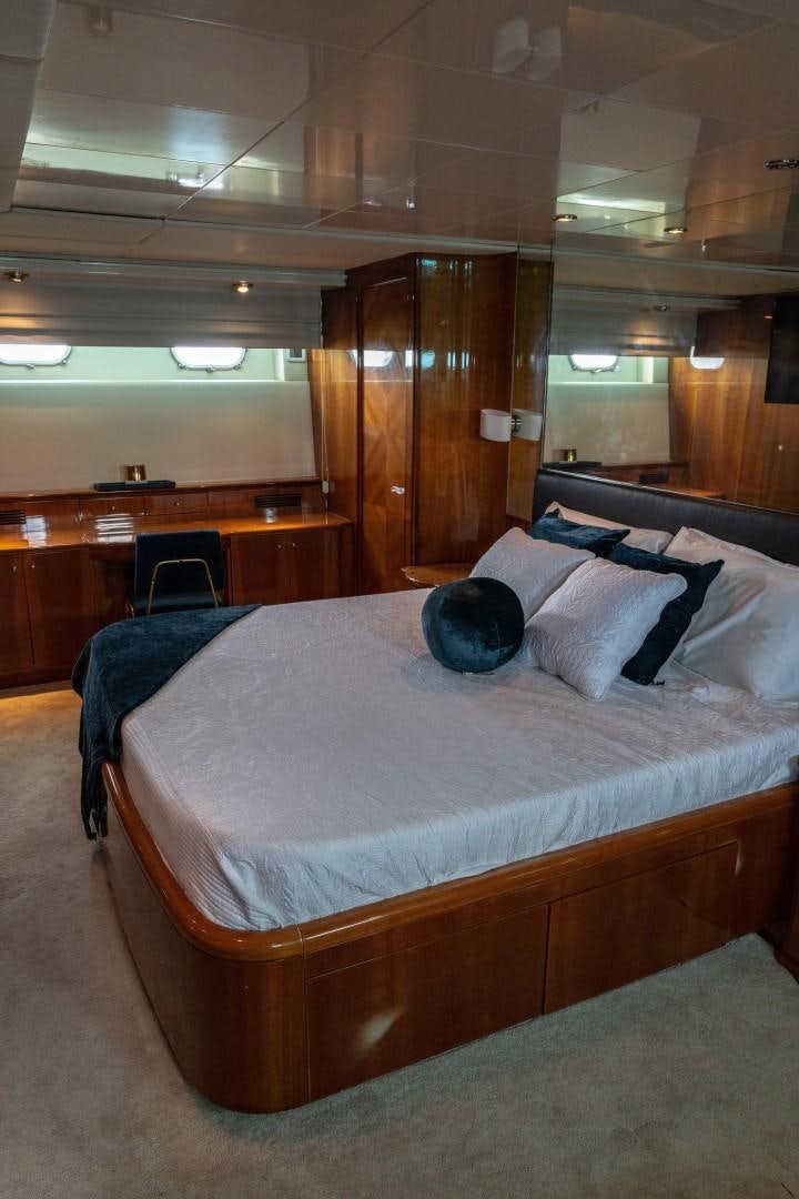 a bed with pillows aboard EL CAPRICHO Yacht for Sale
