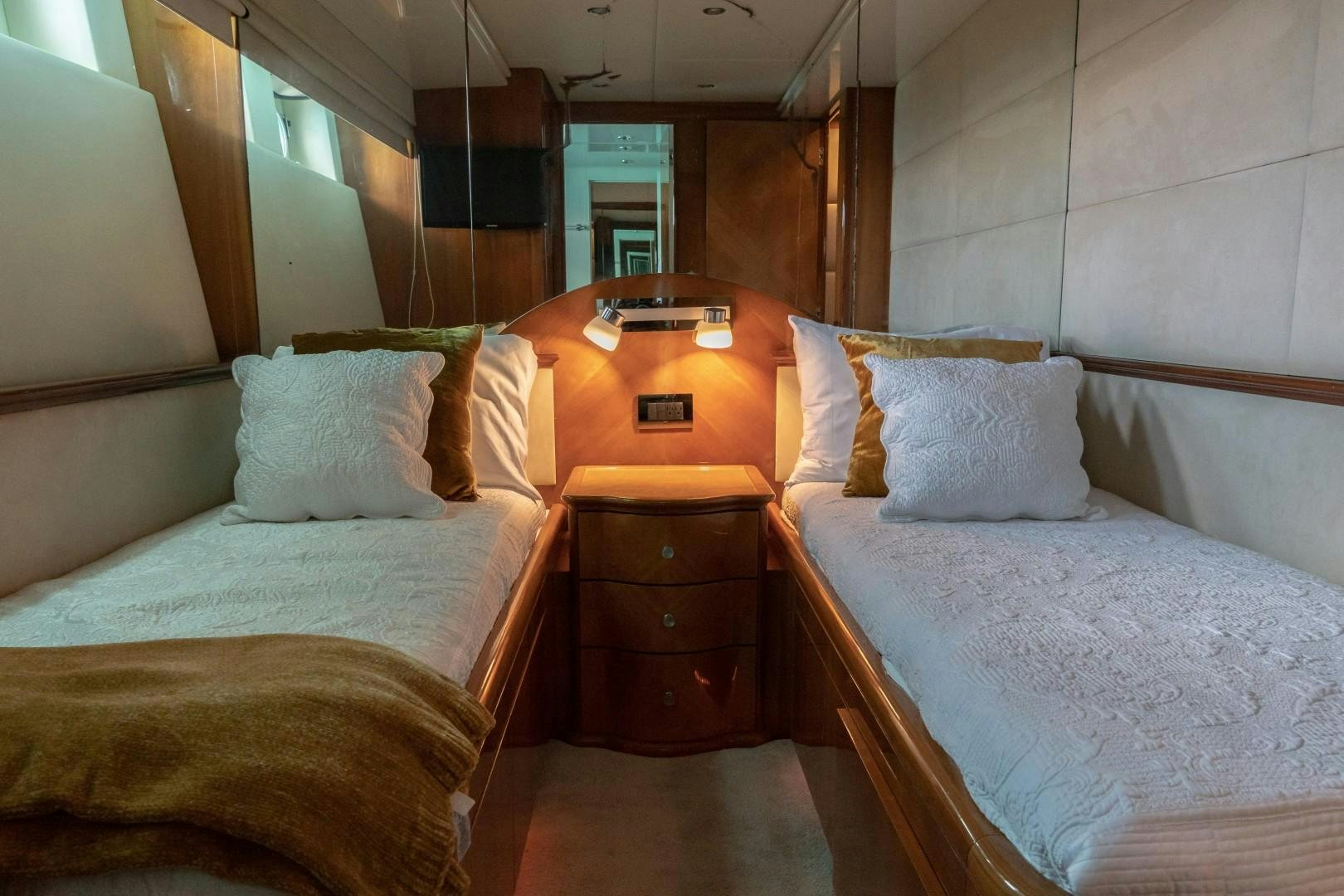 a couple of beds in a room aboard EL CAPRICHO Yacht for Sale
