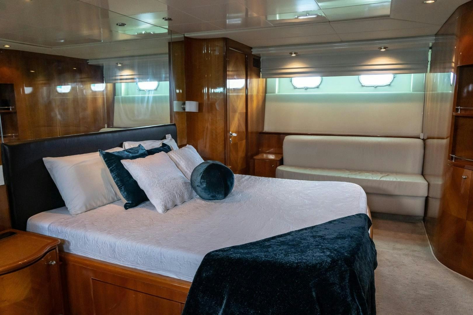 a bed with pillows aboard EL CAPRICHO Yacht for Sale