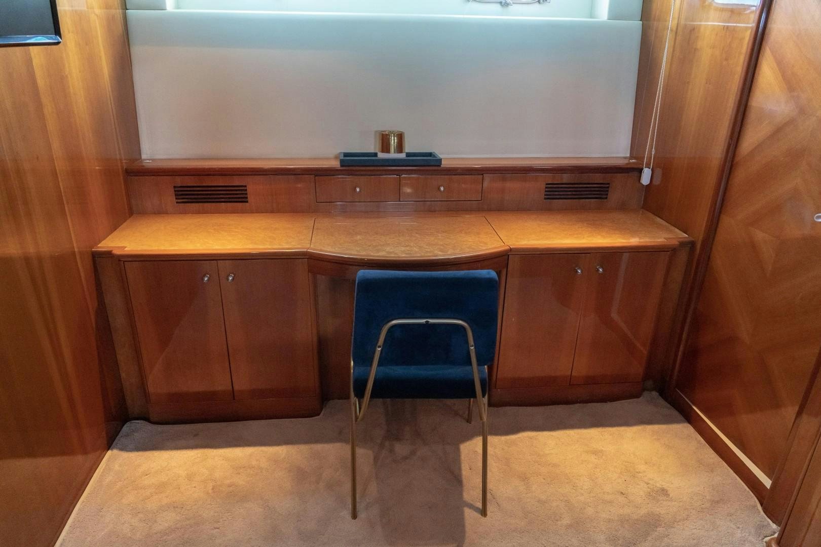 a chair in a room aboard EL CAPRICHO Yacht for Sale