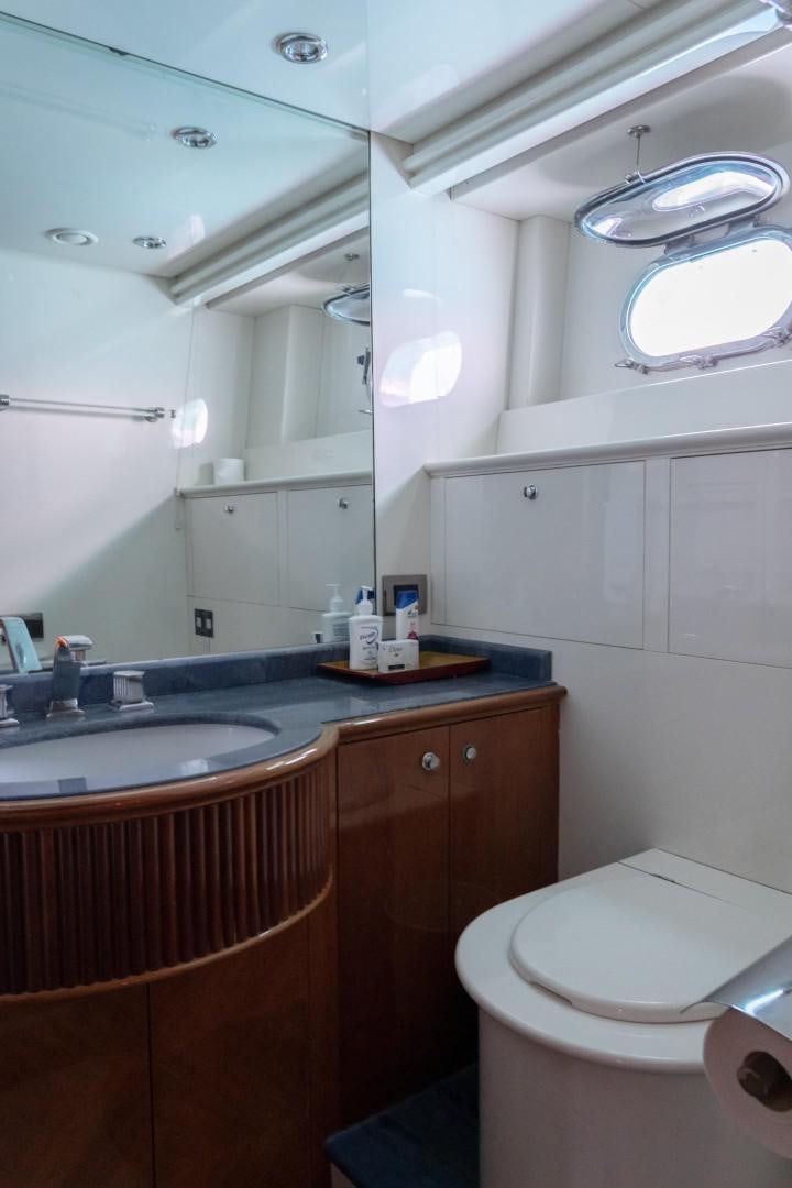 a bathroom with a sink and a toilet aboard EL CAPRICHO Yacht for Sale