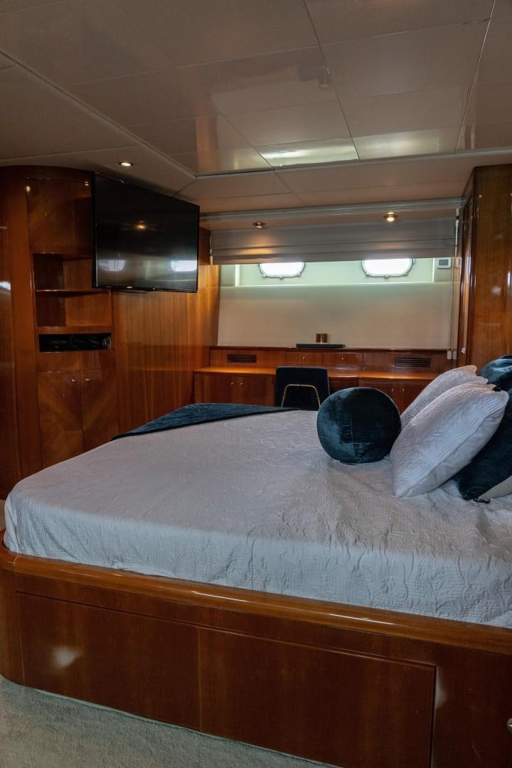 a bed in a room aboard EL CAPRICHO Yacht for Sale
