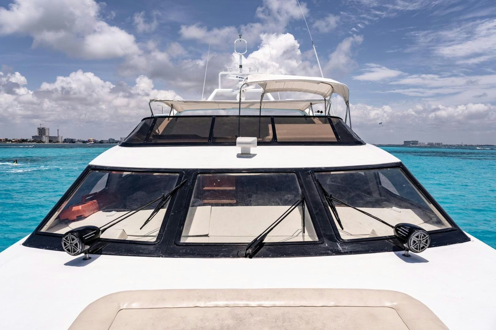 a white car on a boat aboard EL CAPRICHO Yacht for Sale