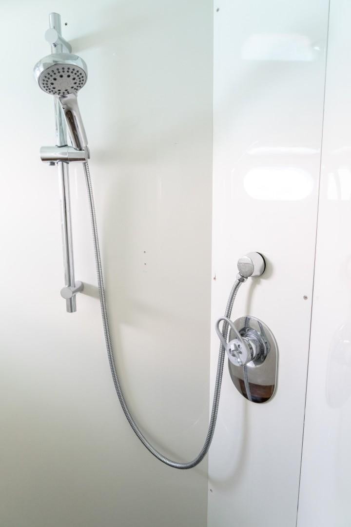 a white shower head aboard EL CAPRICHO Yacht for Sale