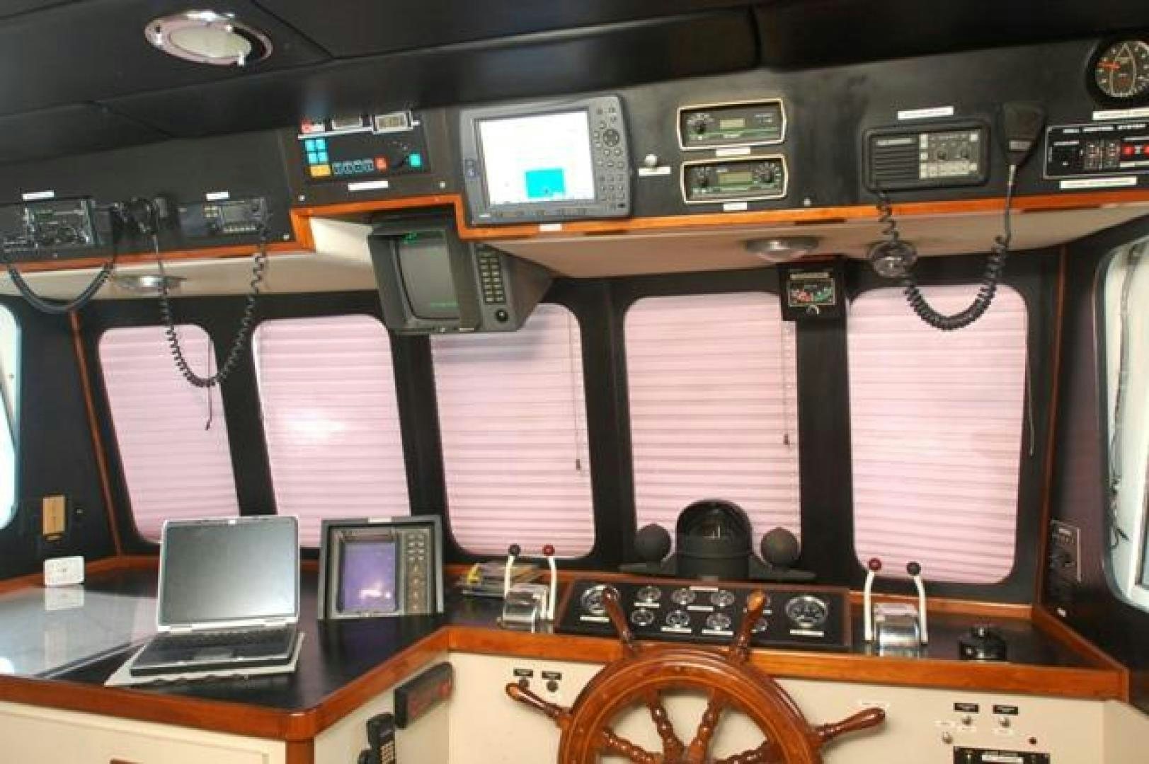 a room with many electronic devices aboard No Name Yacht for Sale