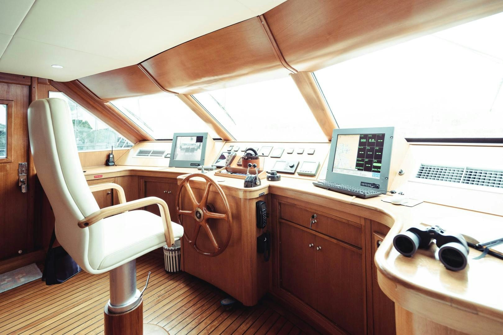 a desk with a laptop and a computer on it aboard WIZARD Yacht for Sale