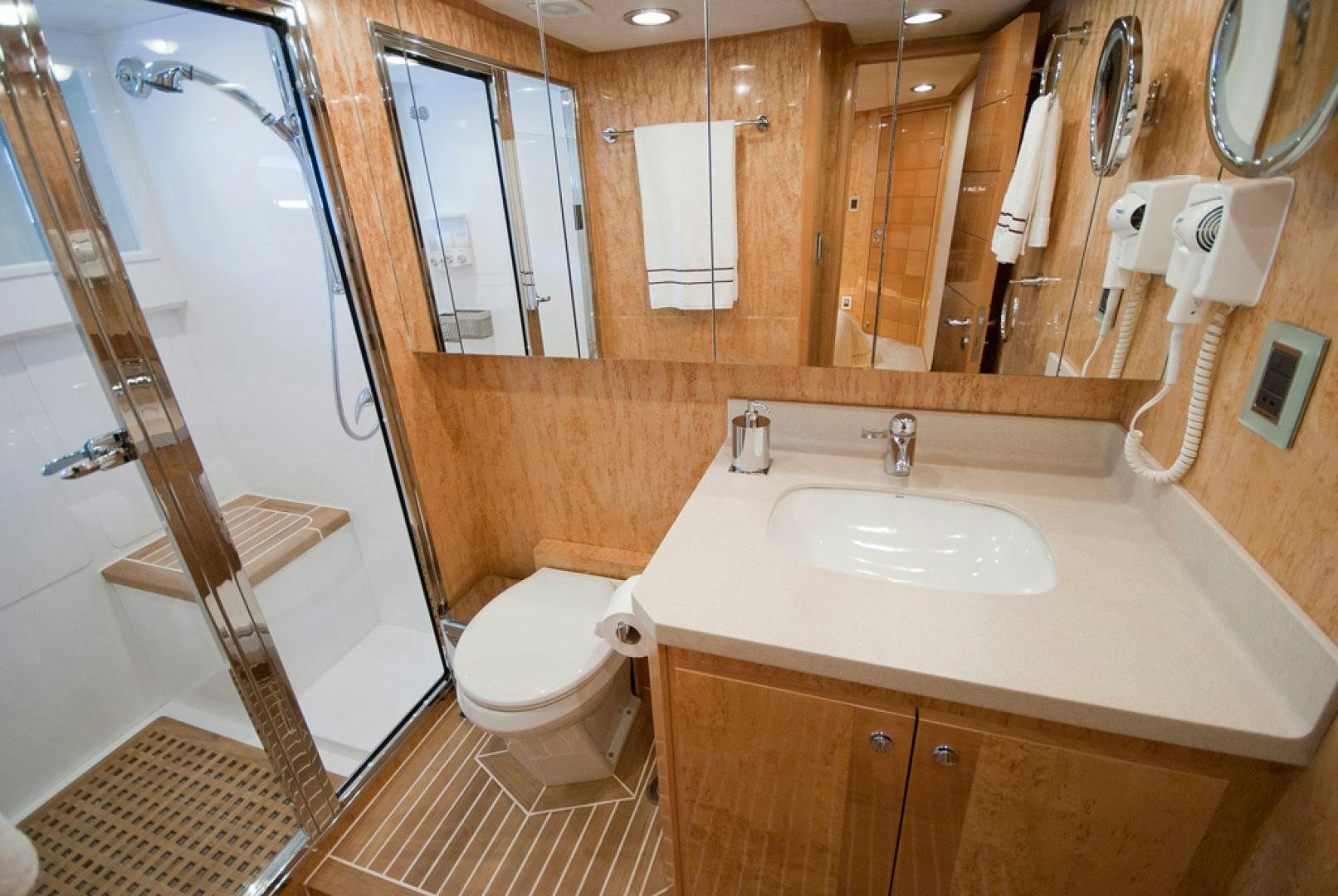 a bathroom with a standup shower aboard RED PEARL Yacht for Sale