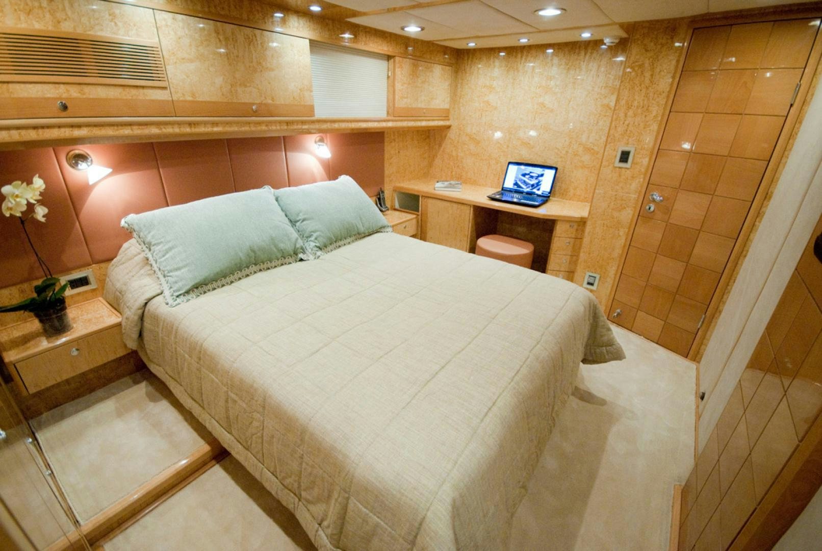 a bed in a room aboard RED PEARL Yacht for Sale