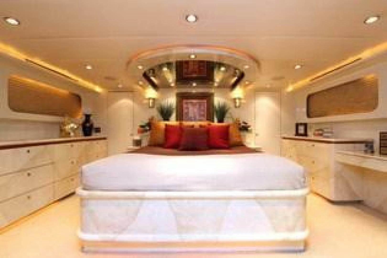 a large bed in a room aboard HARLINA Yacht for Sale