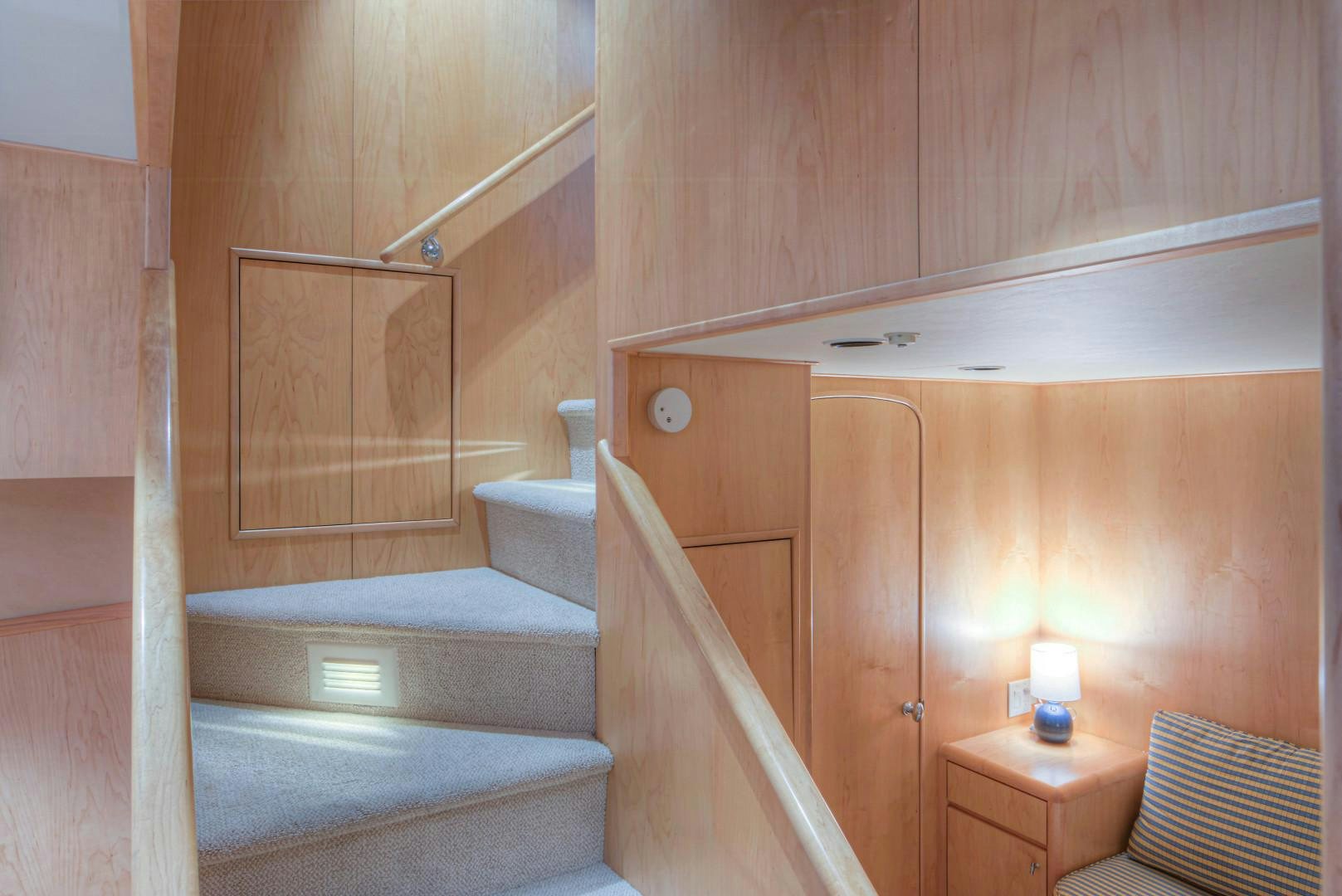 a bathroom with a wood cabinet aboard LADY LEX Yacht for Sale