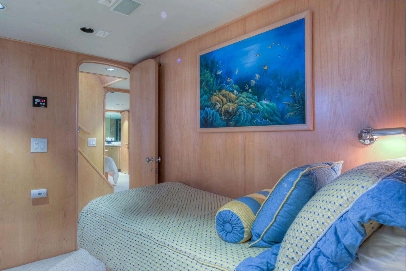 a bed in a room aboard LADY LEX Yacht for Sale