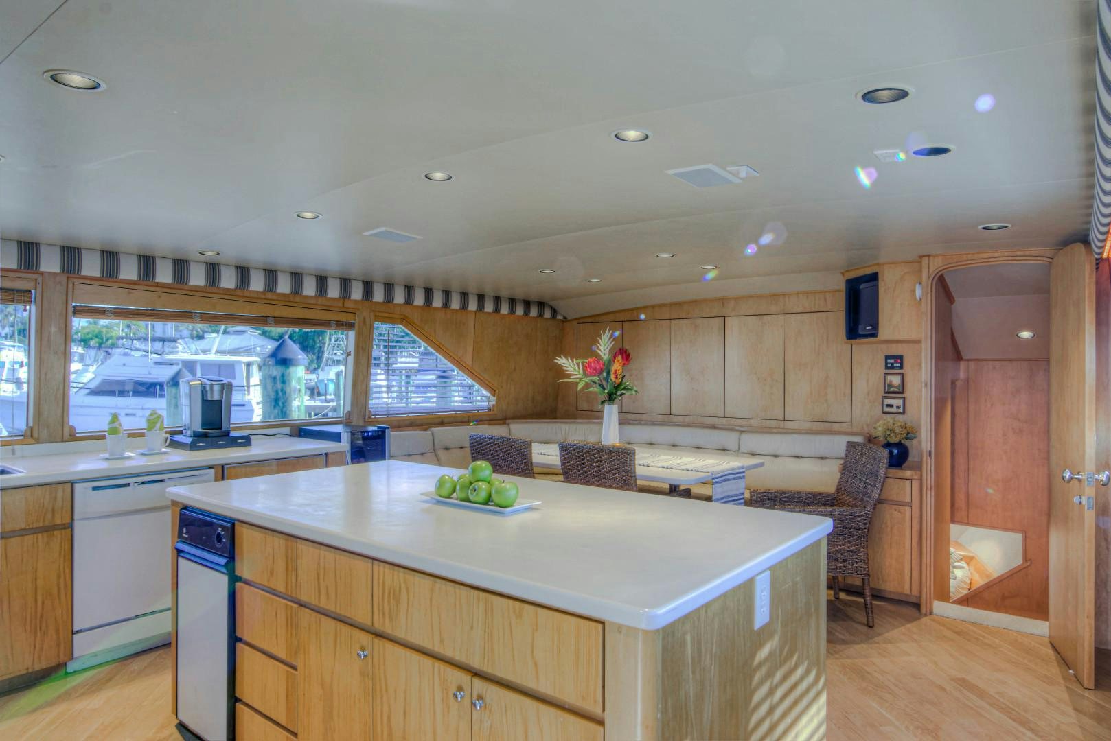 a kitchen with a large island aboard LADY LEX Yacht for Sale