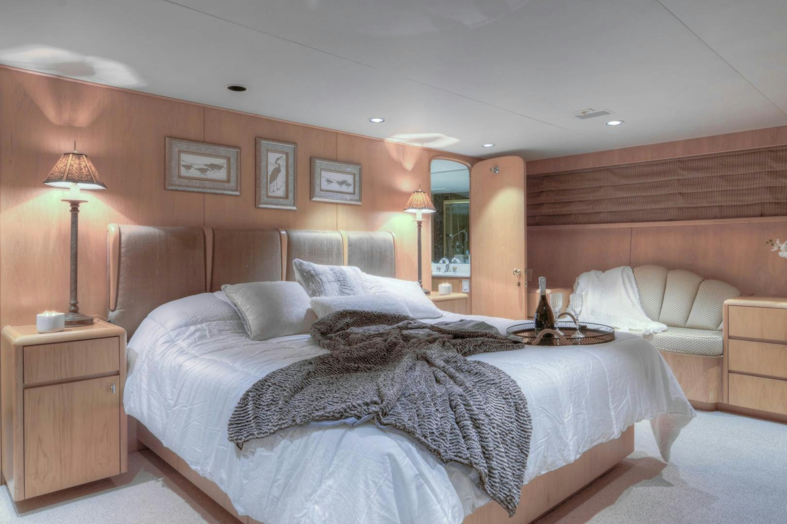 a large bed in a room aboard LADY LEX Yacht for Sale
