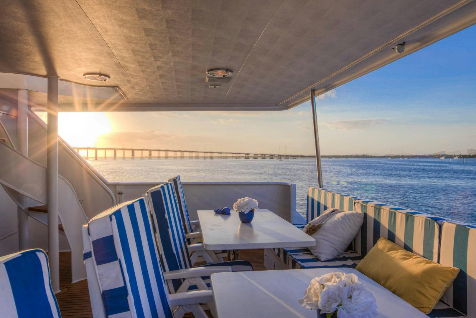 a table and chairs on a boat aboard LADY LEX Yacht for Sale