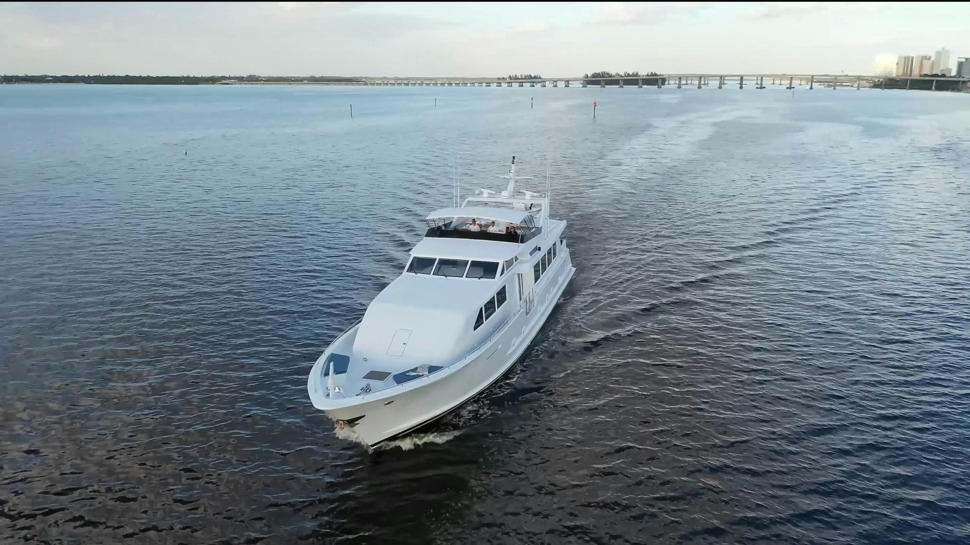 a white boat in the water aboard LADY LEX Yacht for Sale