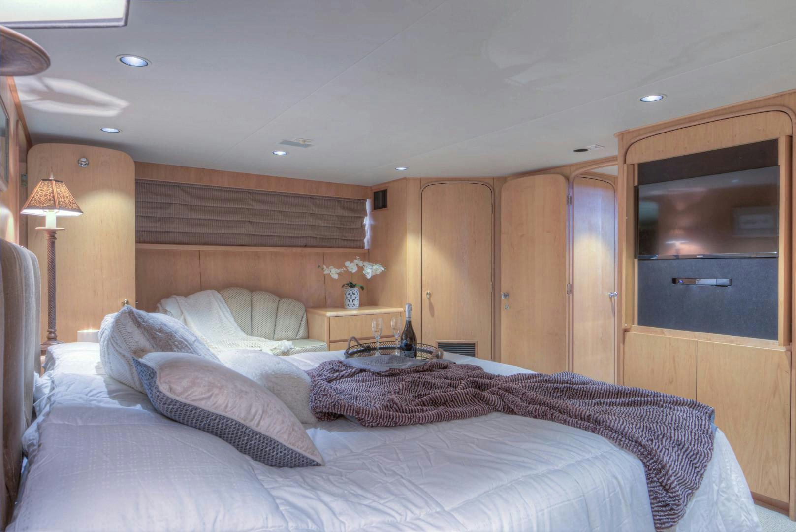 a bed in a room aboard LADY LEX Yacht for Sale