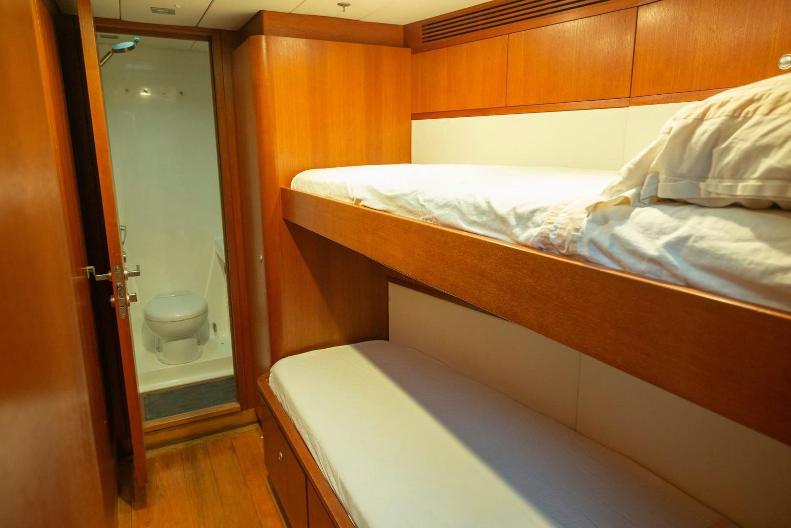a room with two beds aboard VARSOVIE Yacht for Sale