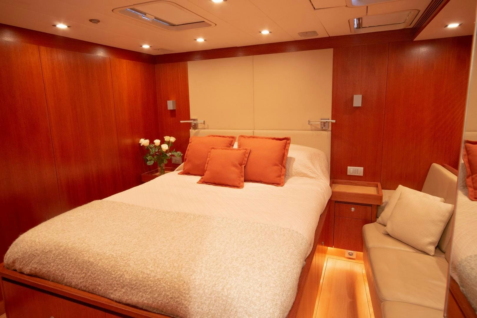 a bed in a hotel room aboard VARSOVIE Yacht for Sale