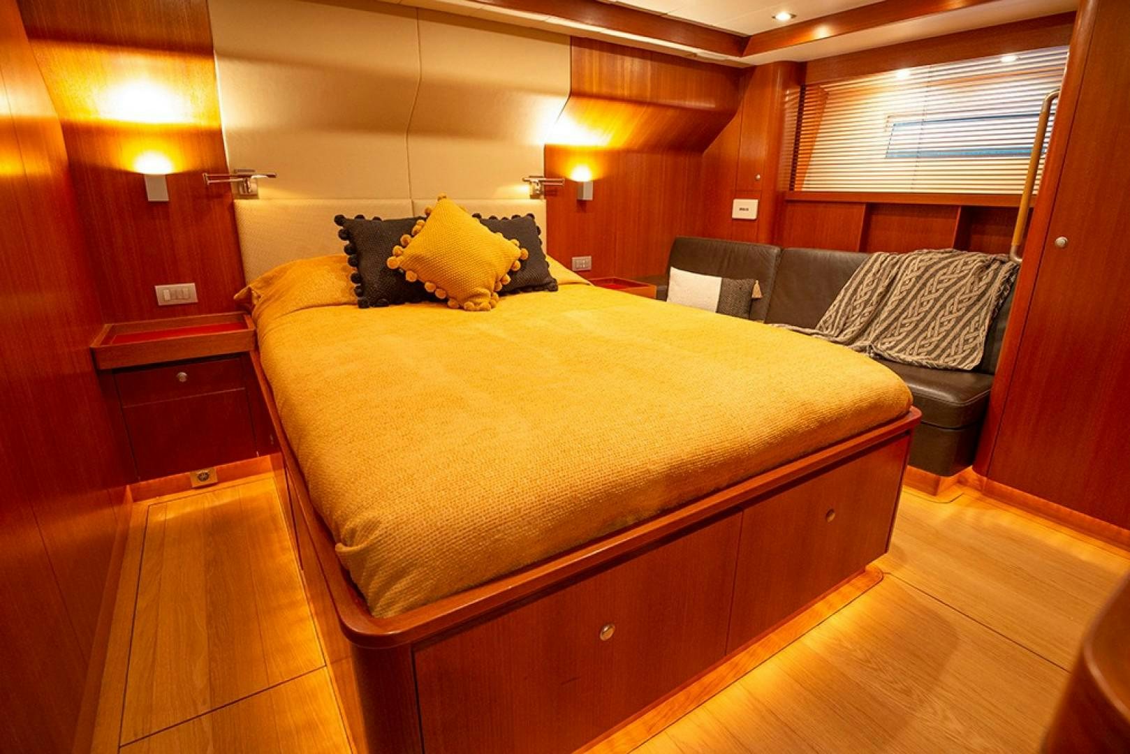 a bed in a room aboard VARSOVIE Yacht for Sale