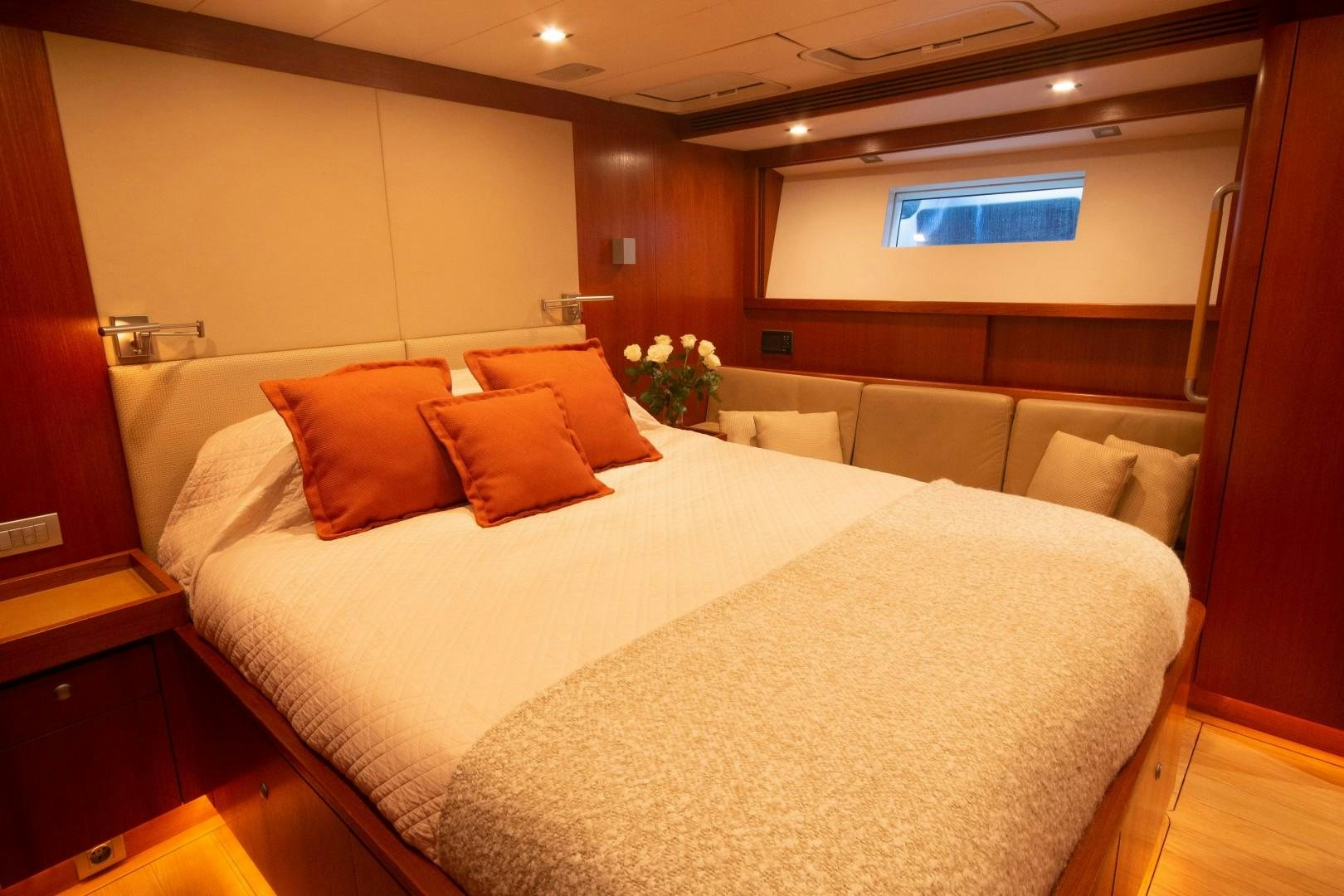 a bed in a hotel room aboard VARSOVIE Yacht for Sale