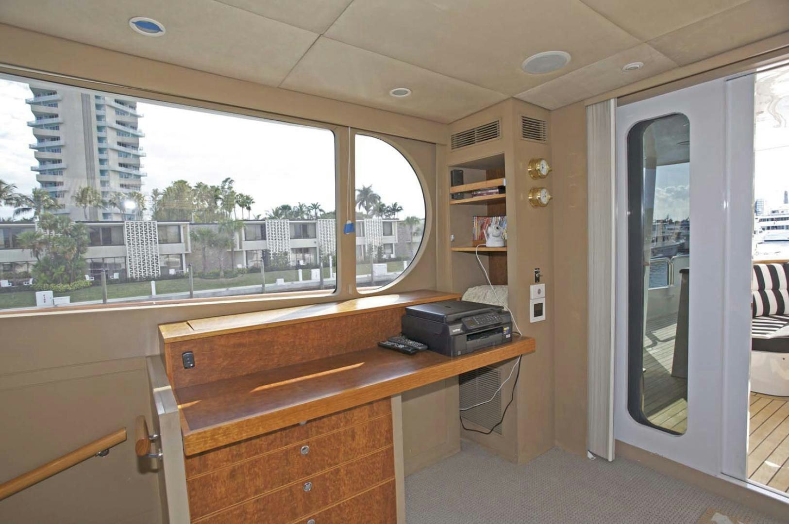 a room with a desk and a computer aboard BRAVO Yacht for Sale
