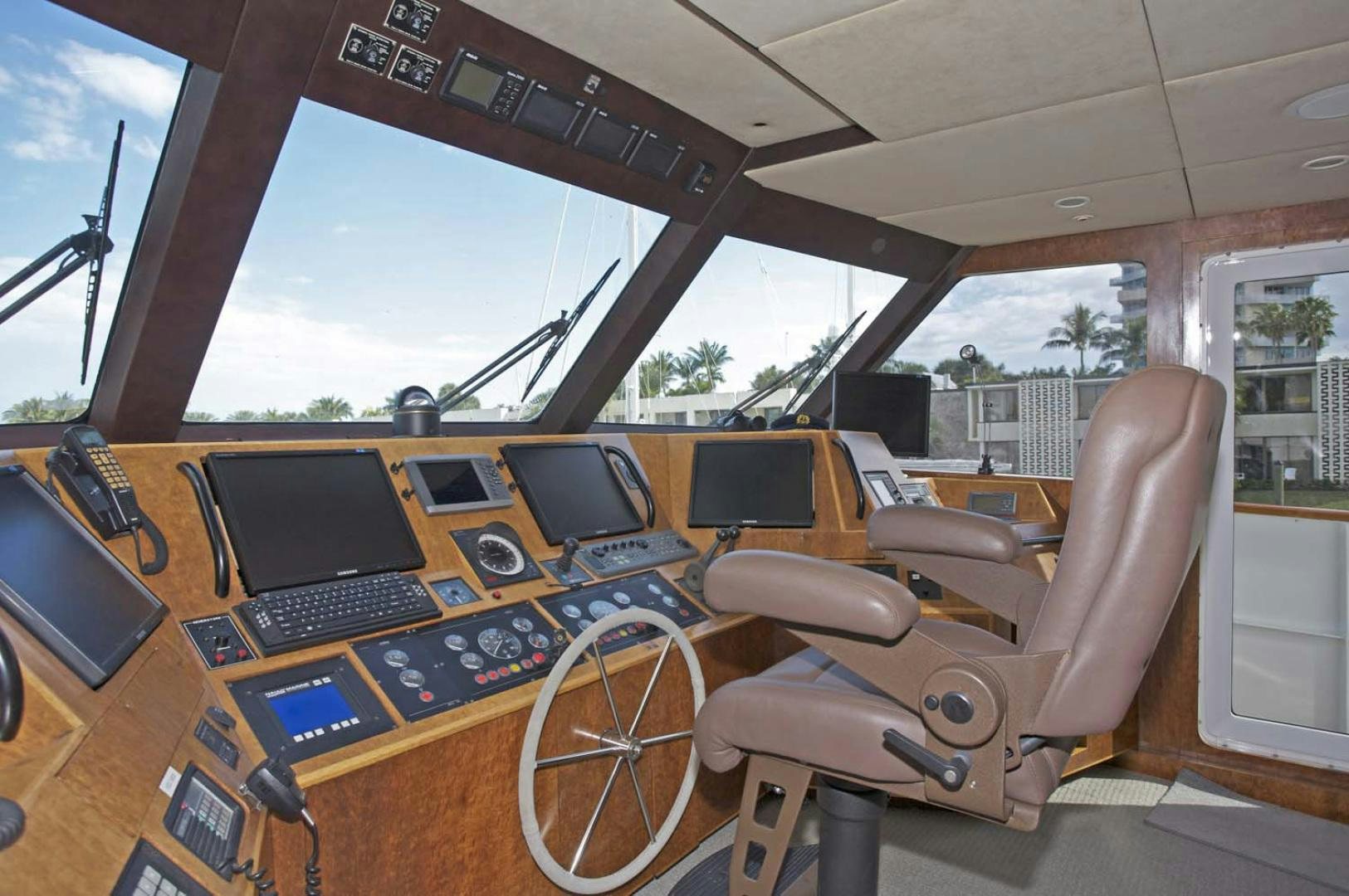 a vehicle with a large screen aboard BRAVO Yacht for Sale