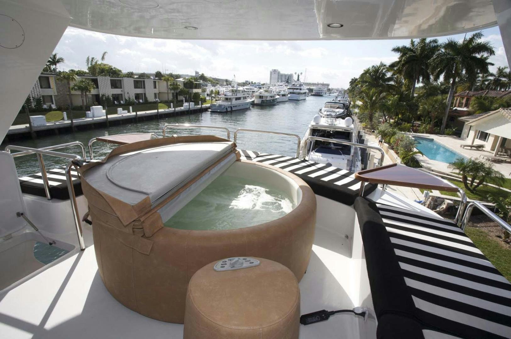 a view of a city from a balcony aboard BRAVO Yacht for Sale