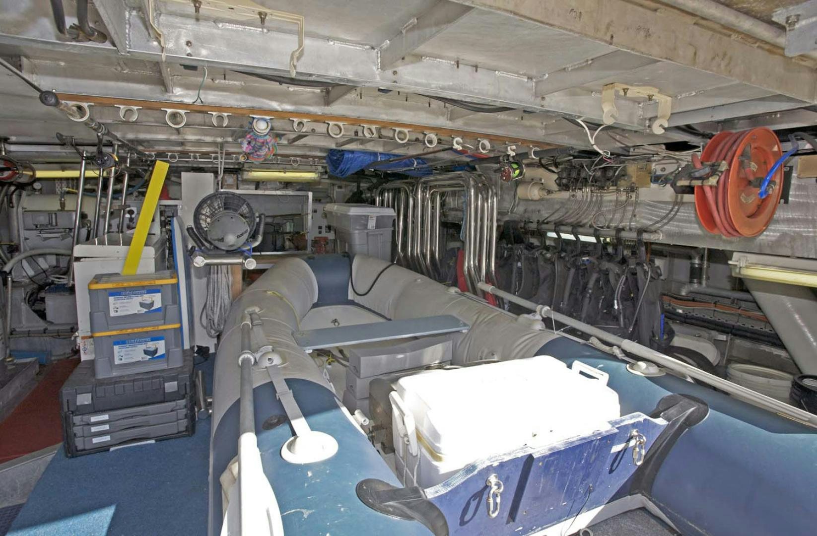 a room with a large machine aboard BRAVO Yacht for Sale