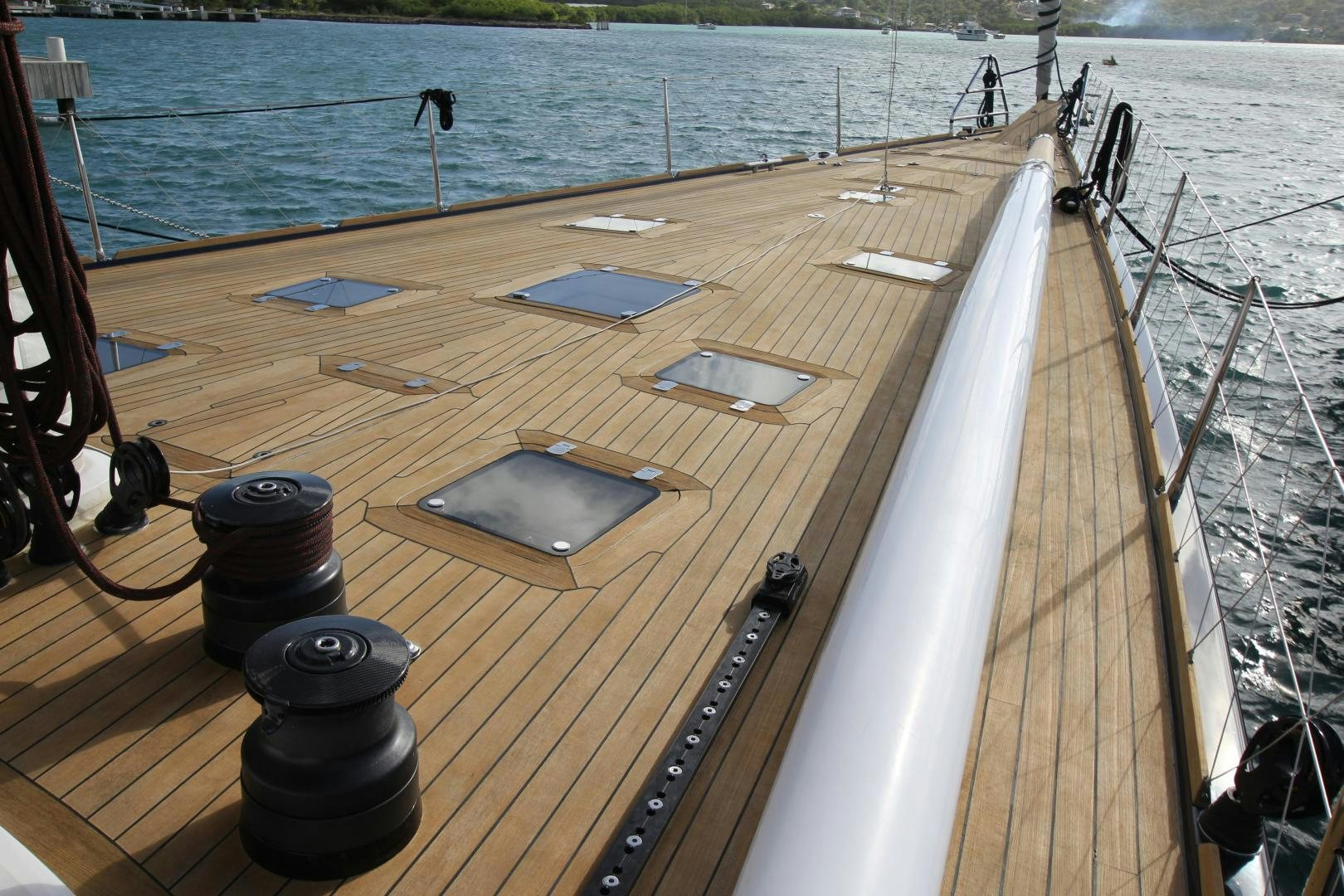 a deck with a table and a grill on it aboard VIRAGO Yacht for Sale
