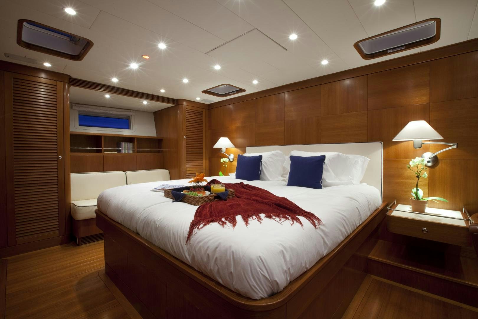 a large bed in a room aboard VIRAGO Yacht for Sale