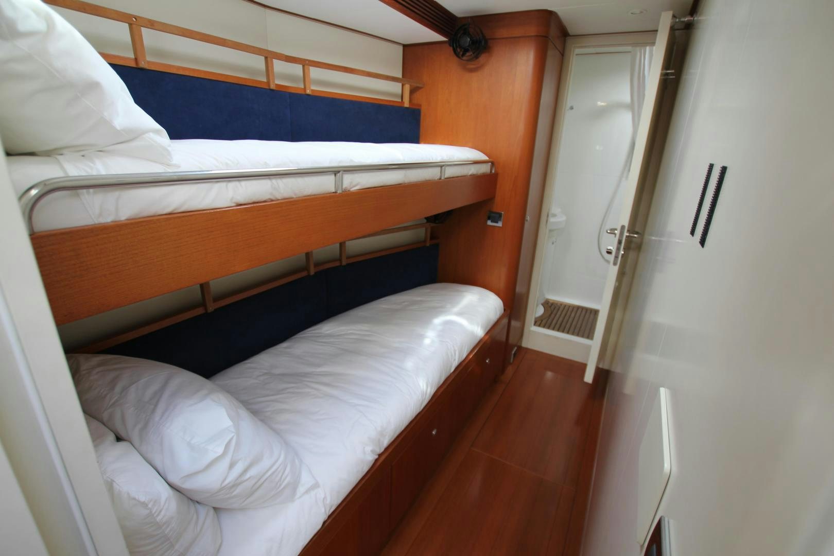 a room with white beds aboard VIRAGO Yacht for Sale