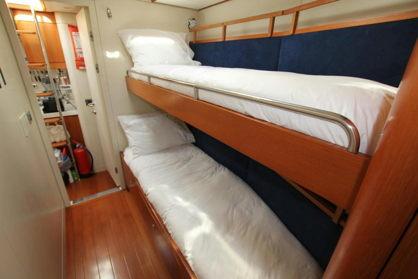 a room with two beds aboard VIRAGO Yacht for Sale