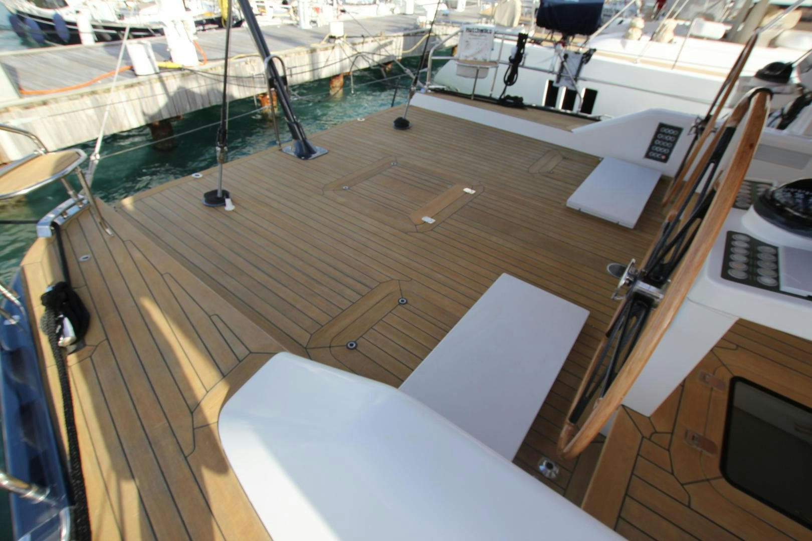 a boat with a wooden deck aboard VIRAGO Yacht for Sale