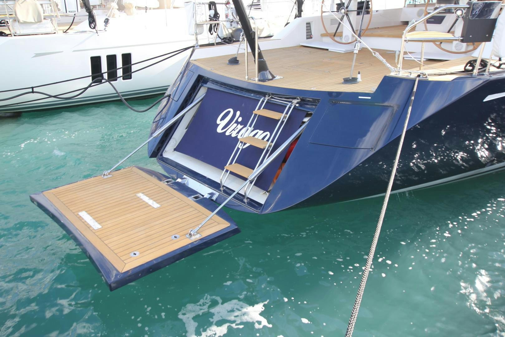 a boat tied to a dock aboard VIRAGO Yacht for Sale