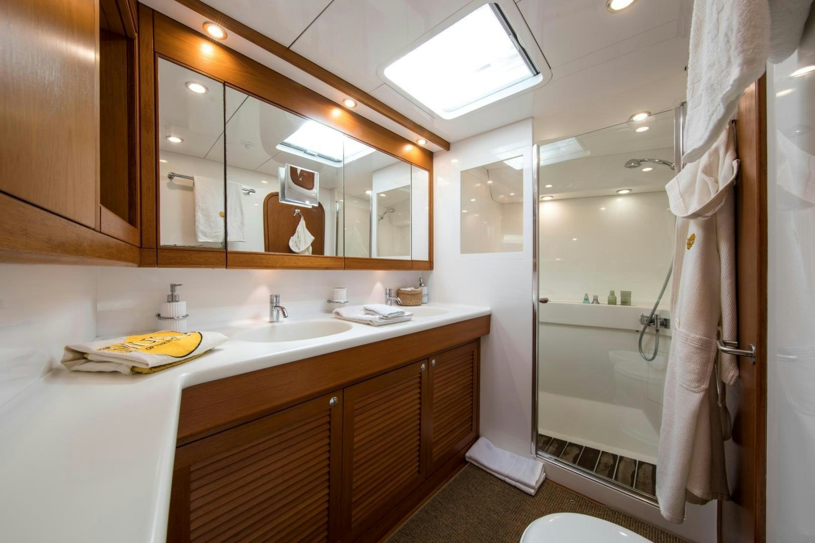 a bathroom with a large mirror aboard MEDUSA Yacht for Sale